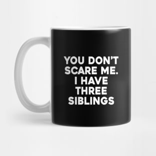 Don't Scare Me, I Have Siblings Mug